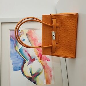 Made in Florence Italy. Orange Leather Amazing Purse.